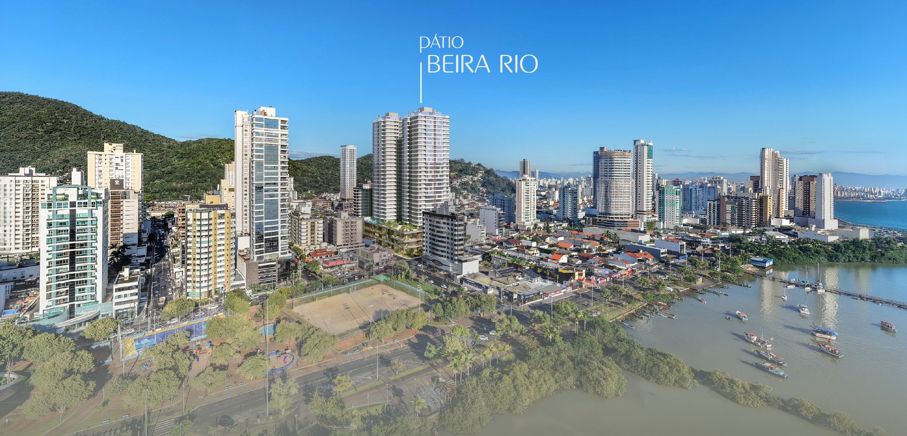 Vista aérea do bairro Fazenda, em Itajaí, com a implantação do Pátio Beira Rio indicada entre as quadras e o rio ao fundo
